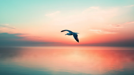 A stunning image capturing a bird soaring gracefully over calm water at sunset, showcasing vibrant pastel colors that evoke feelings of peace and tranquility.の素材