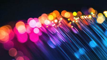 This image features vibrant light trails combined with colorful bokeh effects, creating a stunning abstract background perfect for digital art and creative projects.の素材