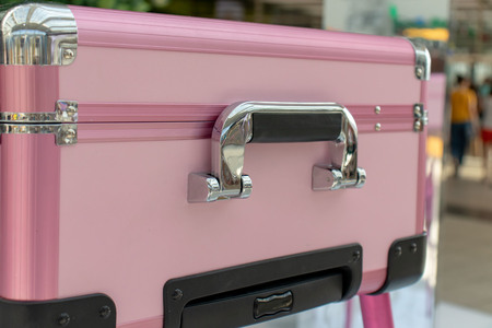 Pink shiny glamour beauty case with chrome handle. Beauty, make-up and fashion conceptの写真素材