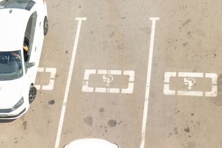 MOSCOW, RUSSIA - AUGUST 29, 2018: Parking for disabled persons near a shopping mall.のeditorial素材