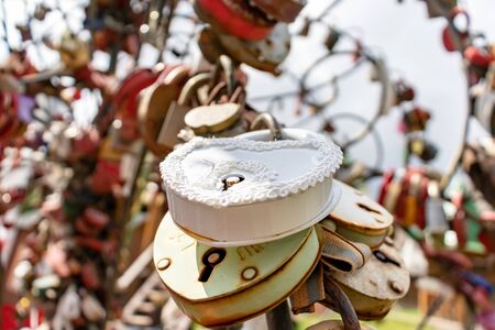 Moscow, Russia - August 03, 2019: Many wedding multicilored locks, castles on a wedding tree as a symbol of eternal love and happiness.のeditorial素材