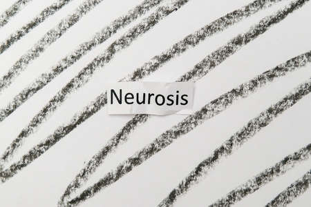 A word neurosis on a charcoal anxiety backgroundの写真素材