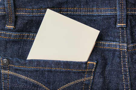 A white blank card in a dark blue jeans pocket for text, copy spaceの写真素材