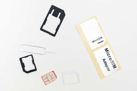 Sim card,sim card adapter, sim card eject tool for changing or removing, digital media put on white...