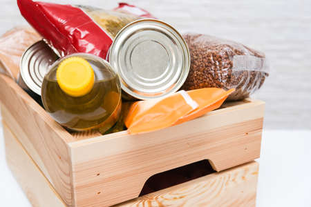 Donation box with food in it for homeless and peeple in need after nature disasterの写真素材