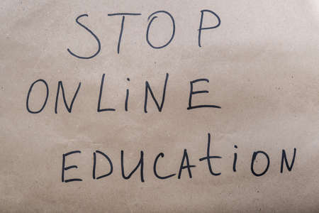 Banner with a sign stop online education, struggle against distance learningの写真素材