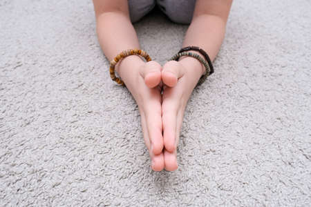 Hands showing praying buddha gesture, worship and faithの写真素材