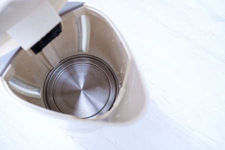 Calcified electric kettle after cleaning, the result of descaling agent or citric acidの写真素材