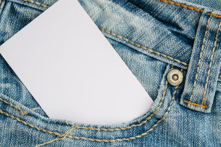 White label, card with information copy space in a jeans pocket, sale and discount conceptの写真素材