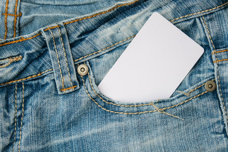 White label, card with information copy space in a jeans pocket, sale and discount conceptの写真素材