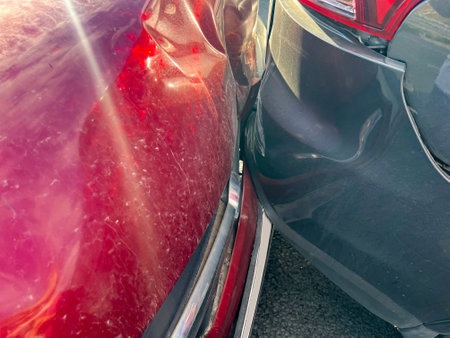 Two damaged cars in a road accident close upの写真素材