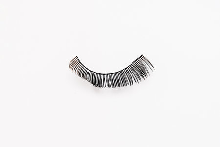 False eyelashes on white background. Cosmetic products for beauty and makeup artist.の写真素材