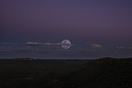 Super Moon over A Canyon in Lonesome National Parkの写真素材