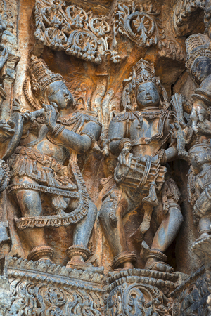 Carving of musicians Temple at Halebidu, from the twin temple towns of Belur- Halebidu, Karnataka, Indiaのeditorial素材