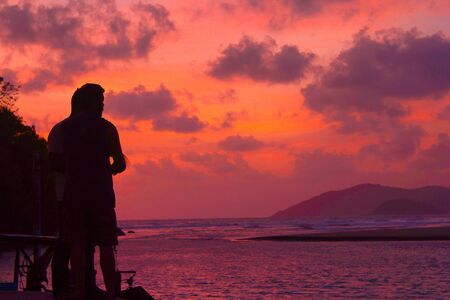 Sihouette on man in sunset, Goa