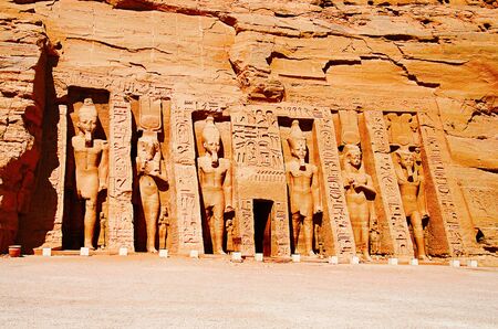 Partial view of two massive rock temples, The twin temples were originally carved out of the mountainside during the reign of Pharaoh Ramesses II in the 13th century BC, as a lasting monument to himself and his queen Nefertariの写真素材