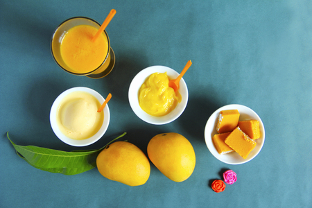 Top view showing alphonso mango and its by-products like sweet, ice cream and shake, Puneの写真素材