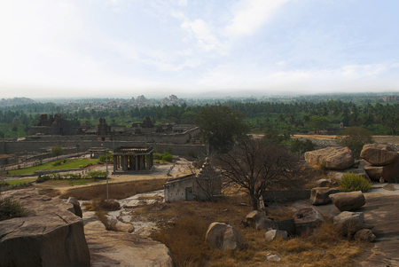 View from Hemkuta Hill, Hampi, Karnataka, India. Sacred Center. Krishna temple in the distance on the left and Sasivekalu Ganesha temple on the right side is seen.の写真素材