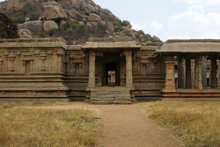 Achyuta Raya temple, Hampi, Karnataka, India. Sacred Center. View from the east. Also seen is the entrance to ardha-mandapa, a portion of the maha-mandapa and the Matanga Hill in the background.の写真素材