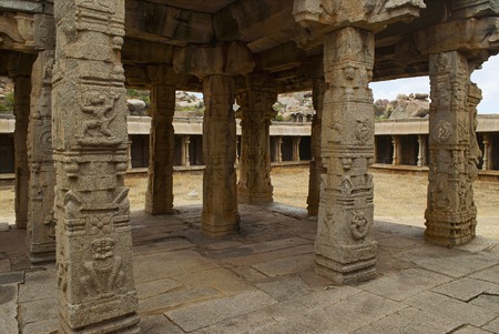 Carrved pillars, maha-mandapa. Achyuta Raya temple, Hampi, Karnataka, India. Sacred Center View from the eastの写真素材