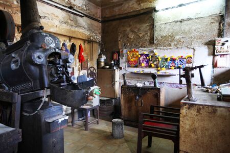 Ancient Projector room at single screen cinema, Maharashtra, India.
