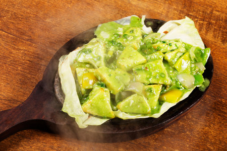 Sizzling SautâÂ©ed vegetables served in hot plateの写真素材