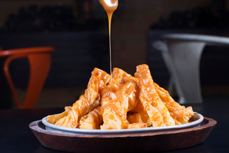 Twisted Khari an Indian snack with honey and caramel sauce
