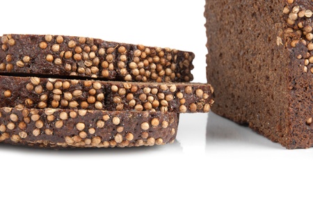 Borodino rye bread sliced on a white background