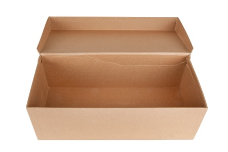 Closed shipping cardboard box isolated on white