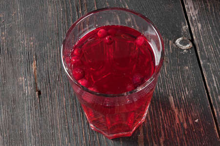 stewed cranberries and other berries in a glassの写真素材