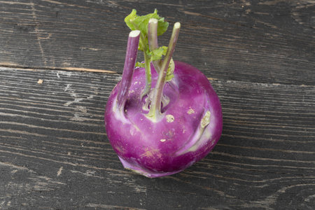 Kohlrabi cabbage on wooden tableの写真素材