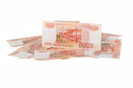 Russian currency - heap of russian ruble banknotes on a white backgroundの写真素材