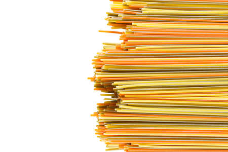 multicolored spaghetti pasta on a white background