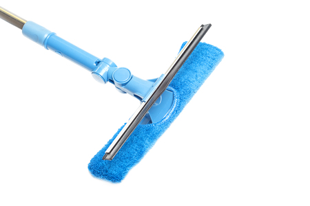 blue mop with a sponge on a white backgroundの写真素材