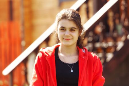 teenager looking at the camera smilingの写真素材