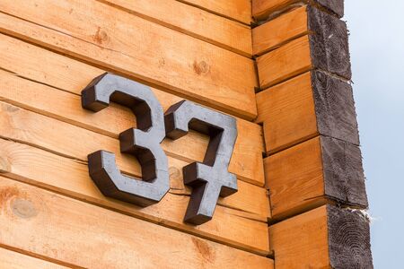 House made of wood with the number 37の写真素材