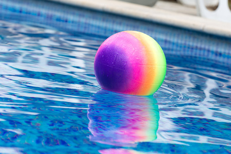 colorful ball floating in a pool
