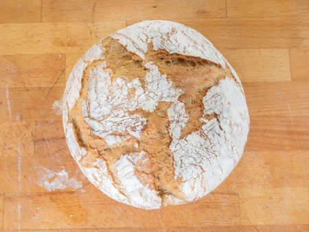 homemade round bread on a board