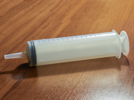 Medical syringe on the tableの写真素材