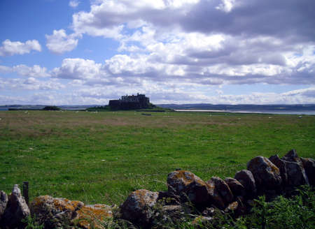 Castle at the Holy Island of Lindisfarne in Northumberlandのeditorial素材