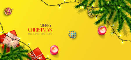 Vector realistic banner Merry Christmas and Happy New Year. With festive elements horizontal orientation in yellow with red candles and presents.のイラスト素材