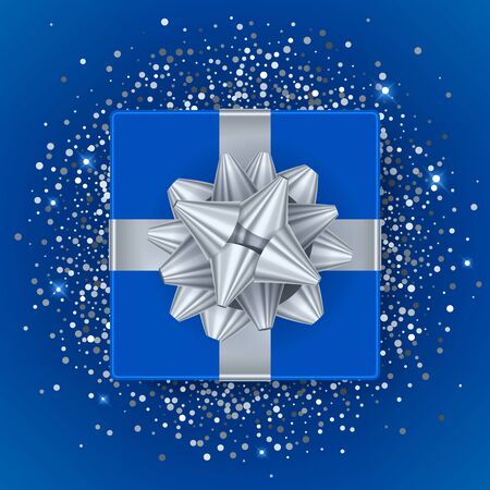 New year christmas blue gift box with silver ribbon and bow - top view vector illustration. Glitter glow sequines on blue background. Good for seasonal advertising poster banner flyer design.のイラスト素材