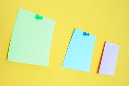 Three stickers on a yellow background