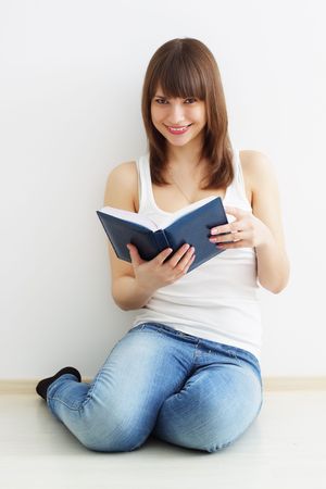Girl and the bookの写真素材