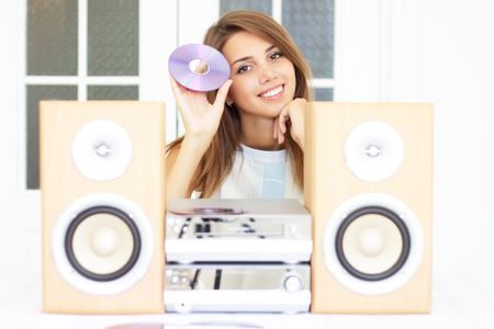 Beautiful girl listening to musicの写真素材