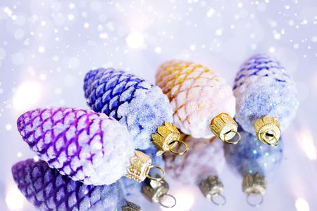 Four decorative pine cones and snowflakesの写真素材
