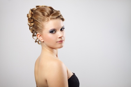 Modern hairstyle. On a gray backgroundの写真素材