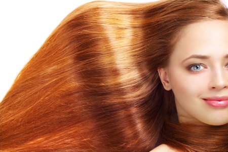 beautiful redhead girl on whiteの写真素材