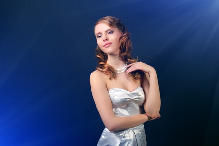 Stylish girl with beautiful makeup on black backgroundの写真素材