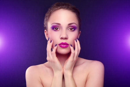 Girl with beautiful make-up on dark backgroundの写真素材